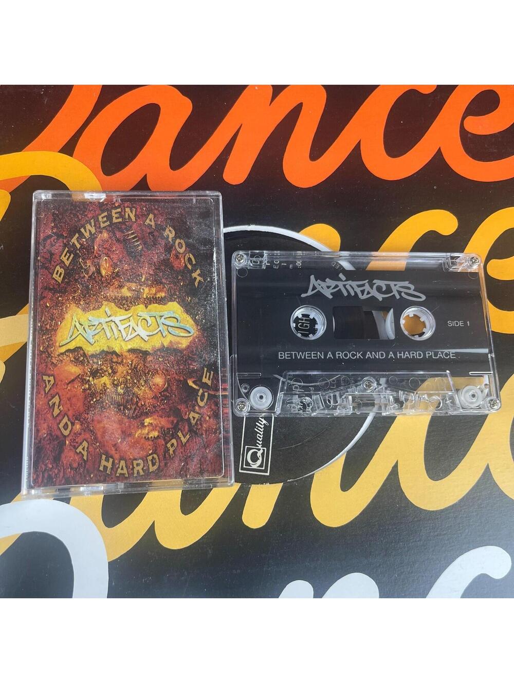 Artifacts Between A Rock And A Hard Place Tape Cassette